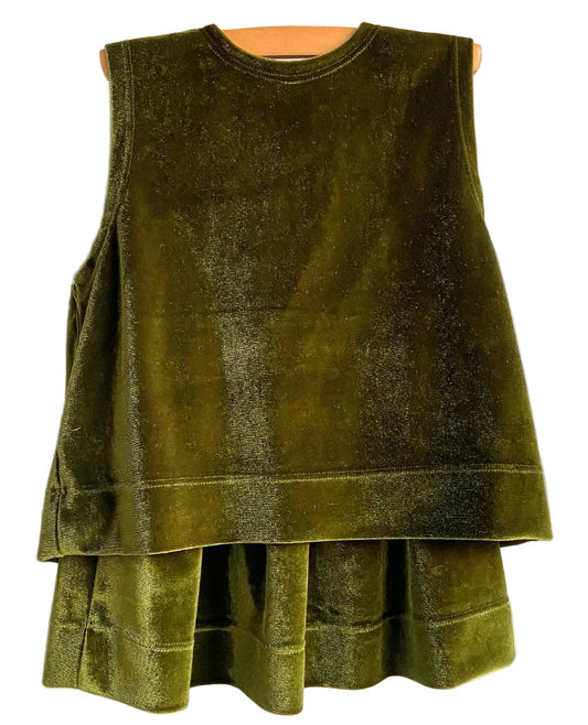 Green velvet dress on a white background