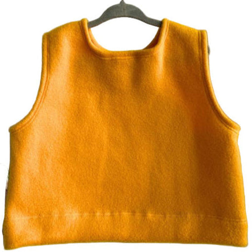 Yellow sleeveless top on a hanger with a white background
